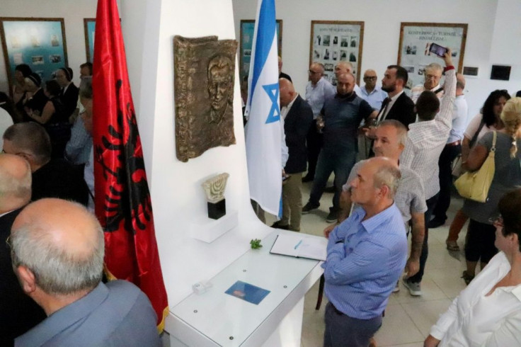 Visitors attend the opening ceremony of the renovated Solomon Jewish hisory museum in the Albanian city of Berat, on September 29, 2019.Albania's sole Jewish history museum reopened in southern Berat on September 29, thanks to a businessman who rescued it