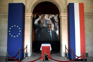 The coffin of former French President Jacques Chirac lies in state during a memorial ceremony at the Saint-Louis-des-Invalides cathedral at the Invalides memorial complex in central Paris on September 29, 2019