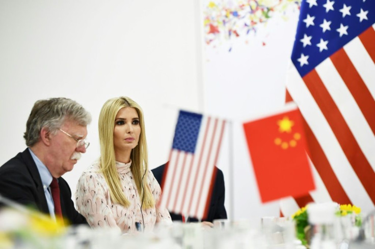 Then US national security advisor John Bolton sits next to President Donald Trump's daughter and adviser Ivanka Trump during a June 2019 meeting with Chinese President Xi Jinping on the sidelines of a G20 summit in Osaka
