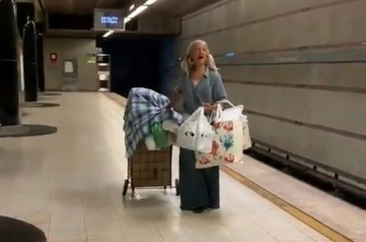 This handout video frame grab from the Los Angeles Police Department shows a homeless woman singing opera in the Los Angeles metro on September 26, 2019