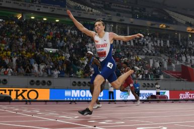 Norway's Karsten Warholm celebrates as he storms to back-to-back 400m hurdles gold medals