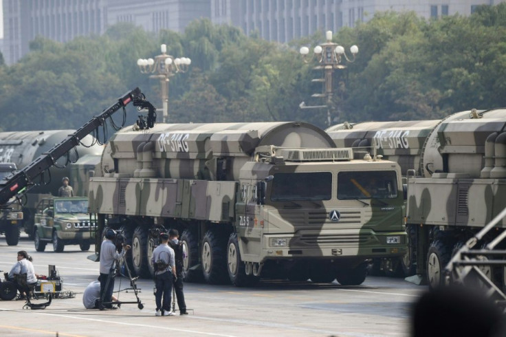 Military vehicles carrying DF-31AG intercontinental ballistic missiles participated in the military parade at Tiananmen Square