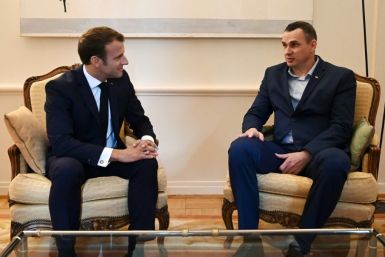 French President Emmanuel Macron (left) meets Ukrainian film director Oleg Sentsov, released last month by Russia in a prisoner swap with Kiev