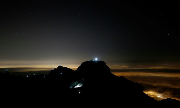 Catalan separatists joined a night-time operation to shine lights from 130 peaks in Catalonia to demonstrate their desire for independence