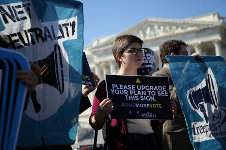 Proponents of "net neutrality" are seen at a 2018 rally as the Federal Communications Commission moved to roll back regulations aimed at treating all online traffic equally
