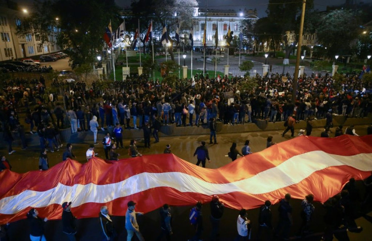 Demonstrators outside the Congress in Lima in support of Peru's President Martin Vizcarra