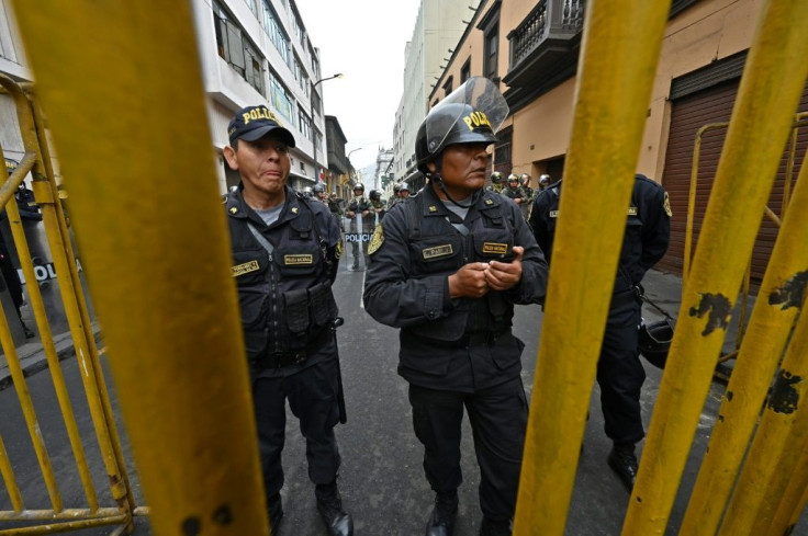 Police block a street leading to the Congress building in Lima, a day after Presiden Martin Vizcarra announced its dissolution, calling fresh elections