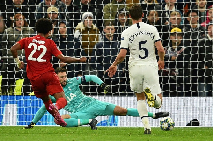 Serge Gnabry (L) beats Hugo Lloris in the Tottenham goal to complete his hat-trick - he scored four overall as Bayern Munich romped to a 7-2 win in north London