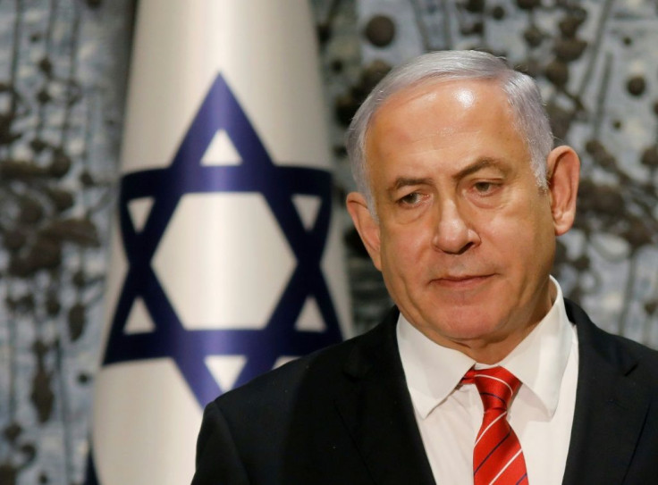 Israeli Prime Minister Benjamin Netanyahu will have to navigate the twin challenges of a potential corruption indictment against him in the weeks ahead and election results that give neither him nor his challenger a clear path to a majority