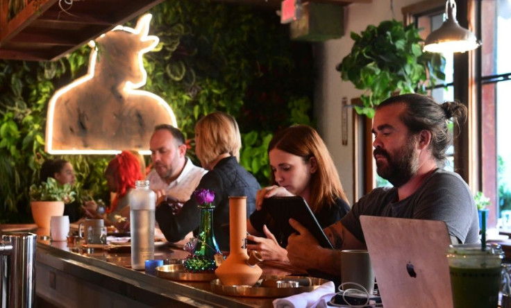Bongs, or water-pipes, are seen among other assorted items on the bar at Lowell Farms: A Cannabis Cafe in West Hollywood, California