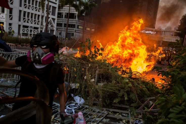 Hong Kong stocks have been hit by worries about the impact on the economy of long-running protests in the city, which saw some of their worst violence on Tuesday