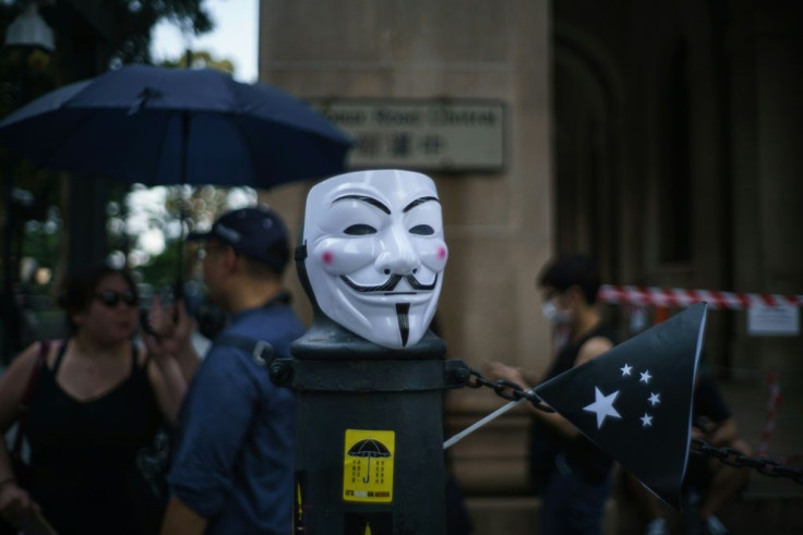 Many online forums encouraged protesters to wear Guy Fawkes masks