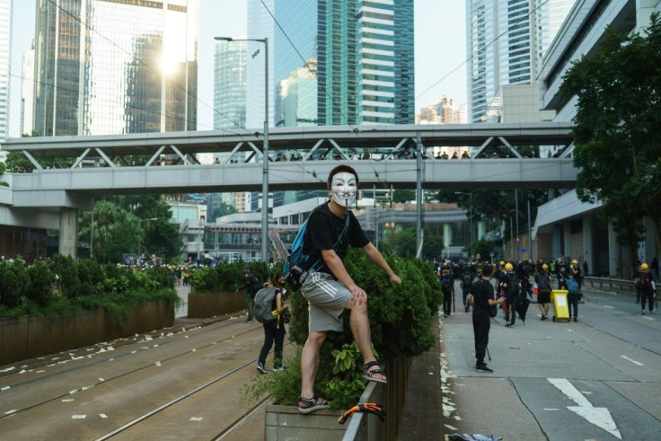 Until recently Guy Fawkes masks had not made much of an appearance at Hong Kong's huge pro-democracy demonstrations