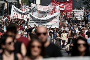 Striking workers joined a rally in Athens to protest government plans to deregulate the labour market