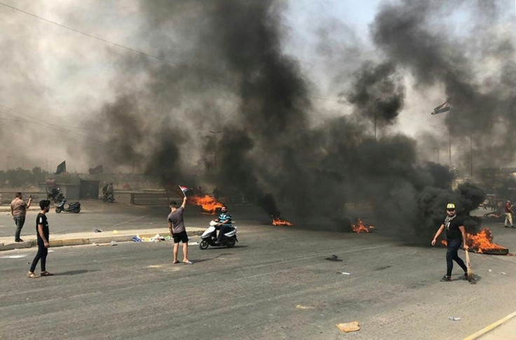 Protests erupt in Baghdad for a second straight day prompting security forces to fire live rounds in the air despite calls for restraint from President Barham Saleh