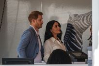 Helping hand: Prince Harry and his wife Meghan, the Duchess of Sussex, at a youth employment hub in Johannesburg