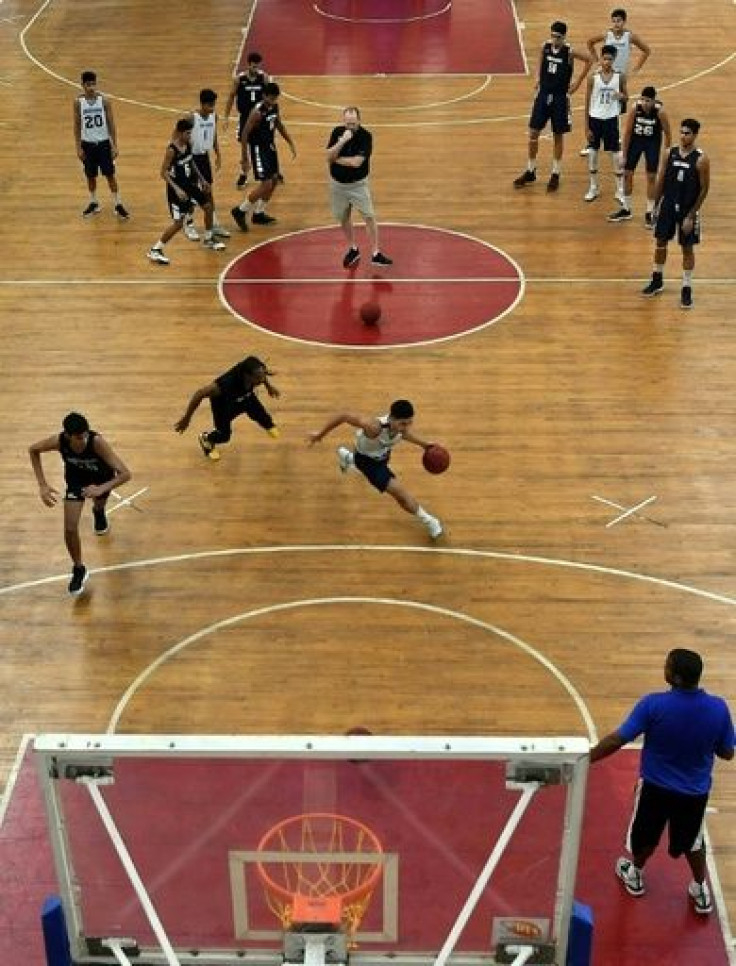 Scott Flemming (top centre), technical director and chief coach of the NBA Academy India, puts players through their paces
