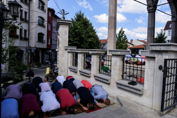 Kosovo muslims pray during Friday prayers at the Grand Mosque in Pristina