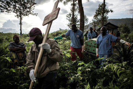 An Ebola victim is buried in Butembo, eastern DR Congo. More than 2,100 people have died in the 14-month-old epidemic