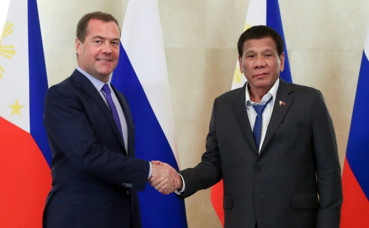 A spokesman for Philippine leader Rodrigo Duterte (right) defended his dishevelled appearance at a meeting with Russian Prime Minister Dmitry Medvedev (left) in Moscow