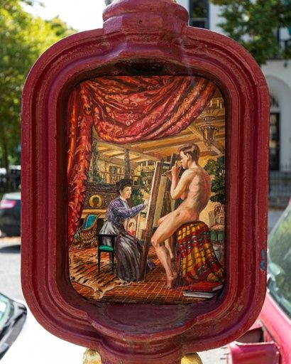 An old police call box is decorated with art by Peter Waddell in Washington's Sheridan-Kalorama neighborhood, as part of a city-wide restoration project that ended in 2009