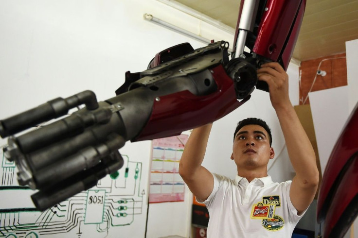 The 100-kilogram (220-pounds) and three-metre (10-foot) high Robot One is controlled by a PlayStation joystick, can make simple moves and utter some basic phrases
