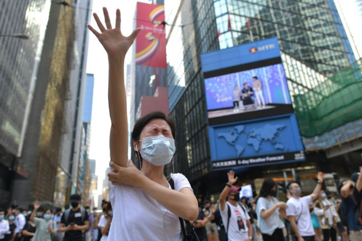 Protesters responded to the new law by hitting the streets, with masks on