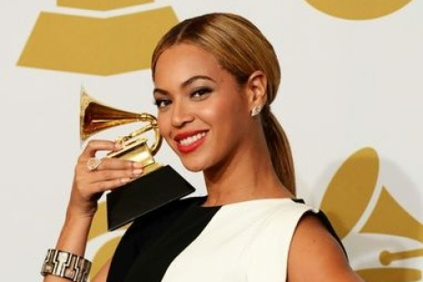 Singer Beyonce, seen here with one of her many Grammy awards, is one of the inspirational women included in the book