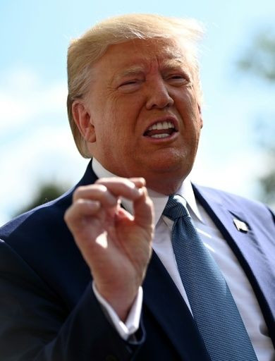 US President Donald Trump immediately cheered the jobs figures despite a rule that government officials should not comment on economic reports until one hour after they are released
