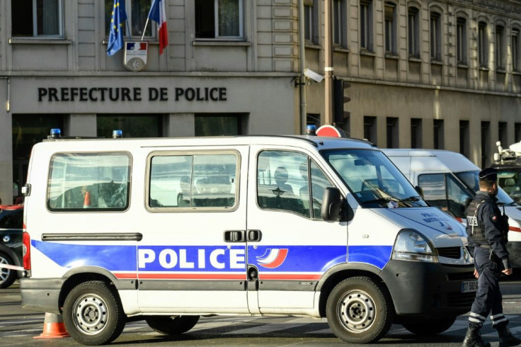 Hundreds of police and headquarters staff observed a minute of silence in the courtyard of the building Friday