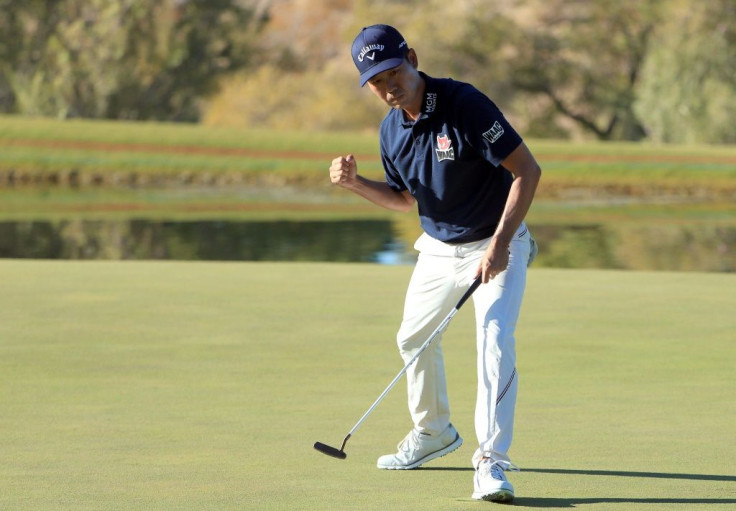 American Kevin Na reacts after a birdie on the 17th hole at TPC Summerlin, where he takes a two-shot lead into the final round of the PGA Tour Shriners Hospitals For Children Open