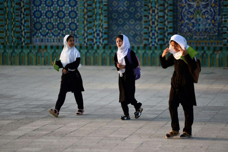 The 2001 invasion did herald some improvements for Afghan girls - like these schoolgirls in Mazar-i-Sharif - who had been banned from school by the Taliban