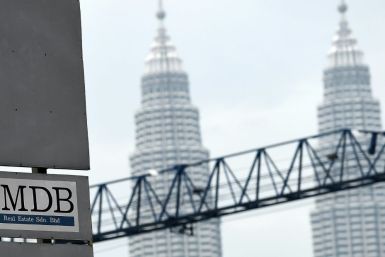 The fines are linked to a wide-ranging probe into billions of dollars that were looted from state investment fund 1MDB between 2009 and 2014