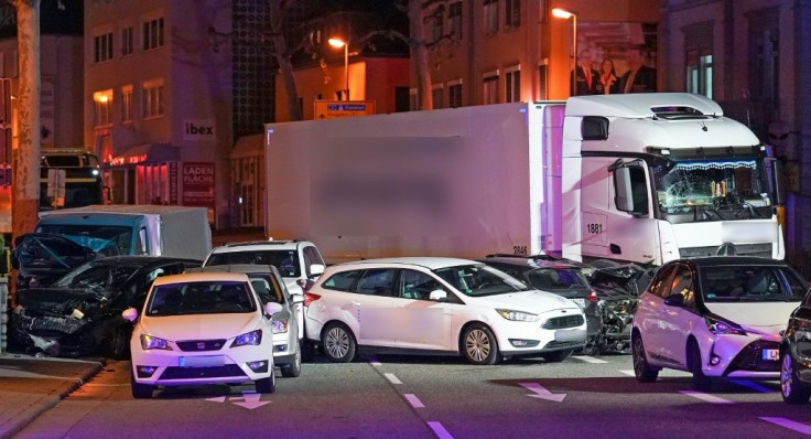 A stolen truck crashed into cars stopped at a red light in Limburg, western Germany, leaving several people injured