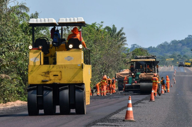 Workers pave the BR163 highway in Itaituba -- President Jair Bolsonaro's government is eager to develop the Amazon to bolster Brazil's weak economy
