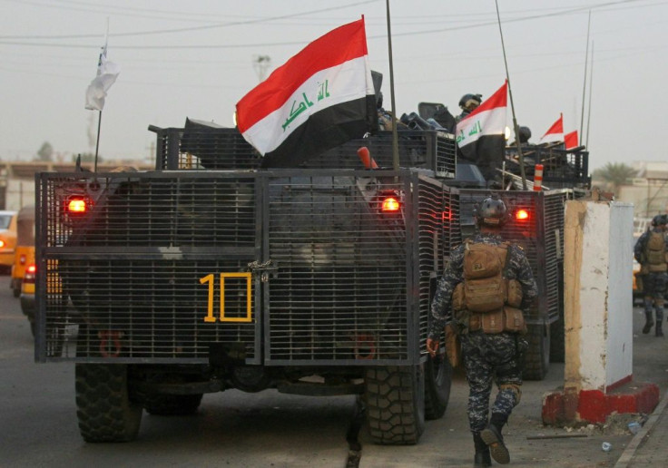 Iraqi police are seen deployed in Baghdad's predominantly Shiite district of Sadr City