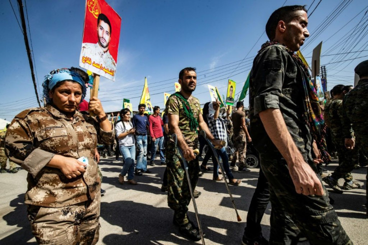 Kurdish fighters and veterans staged demonstrations against Turkey's planned offensive
