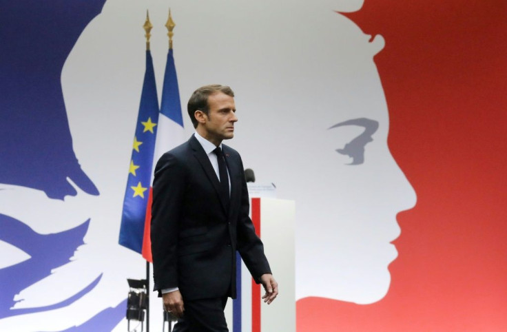 French President Emmanuel Macron at the Paris police headquarters. He blamed the attack on 'a distorted, deadly Islam' which he vowed to eradicate