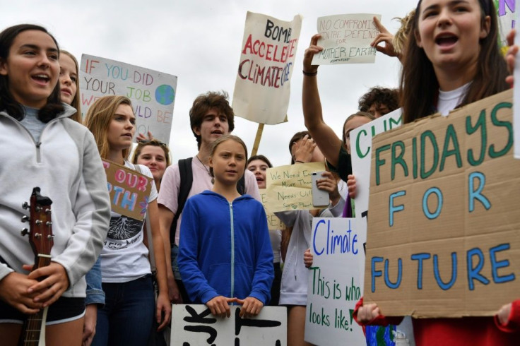 Swedish climate activist Greta Thunberg (C), 16, has inspired a worldwide youth movement demanding governments take action on climate change