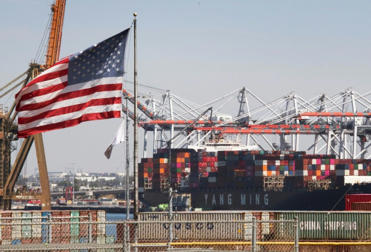 Shipping containers from China and other Asian countries are unloaded at the Port of Los Angeles, as US central bankers fear that President Donald Trump's trade wars could drag down hiring and the broader economy with it
