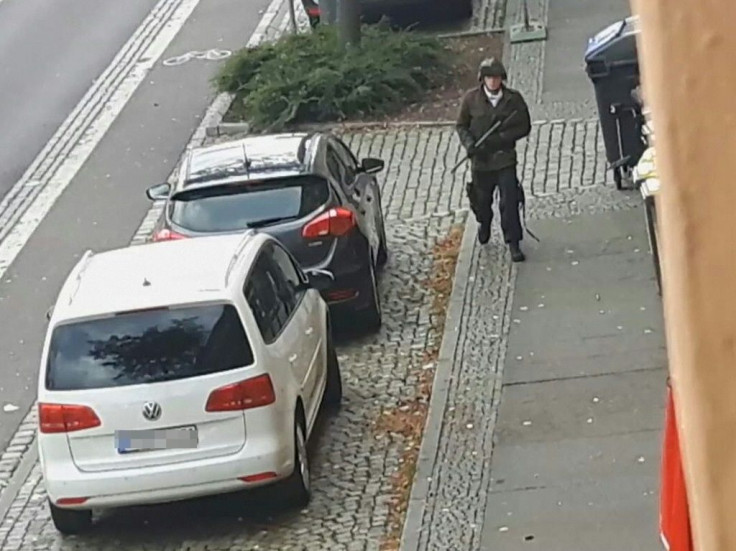 A video screenshot shows an armed man in the streets of Halle on Wednesday