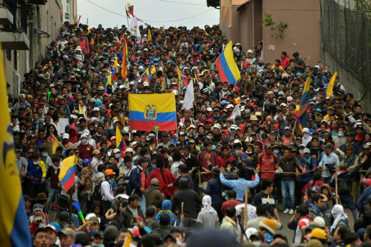 Protesters march in protest against President Lenin Moreno's decision to slash fuel subsidies