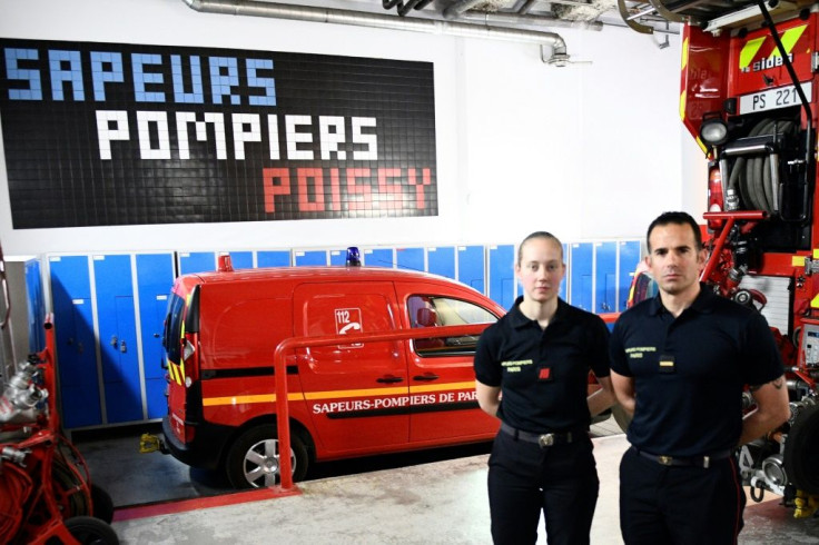 French firefighters Myriam Chudzinski (L) and Jerome Demay were among the first to arrive at Notre-Dame