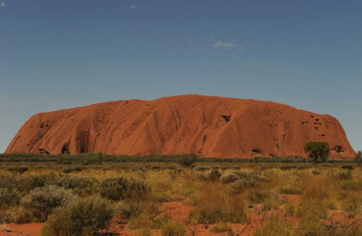 Uluru, formerly known as Ayers Rock, is a a large sandstone rock formation and the world's biggest monolith