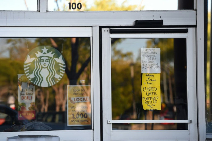 A Safeway grocery store and Starbucks Coffee are closed after the power was shut down as part of a statewide blackout in Santa Rosa, California