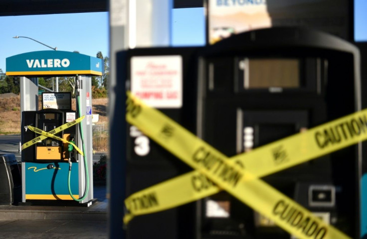 A Valero gas station sits vacant after power was shut down as part of a statewide blackout in Santa Rosa, California