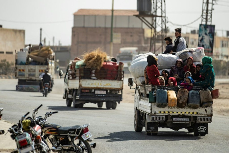 Tens of thousands of civilians have fled the Turkish offensive, virtually emptying Syrian border towns like Ras al-Ain and Tal Abyad