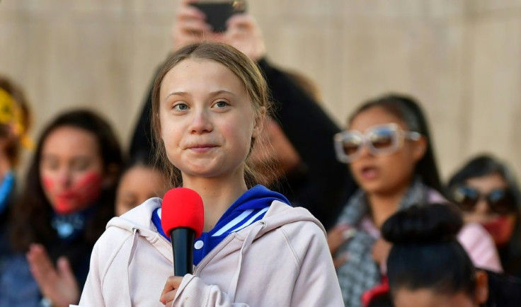 Swedish environment activist Greta Thunberg speaks during a "FridaysForFuture" climate protest at Civic Center Park in Denver, Colorado, on October 11, 2019