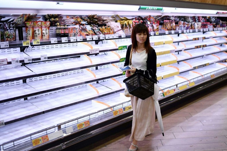 Tokyo residents emptied the shelves of local supermarkets, buying typhoon supplies before Hagibis makes landfall