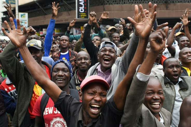 Kenyans in Nairobi following Kipchoge's historic run on a big screen in Nairobi